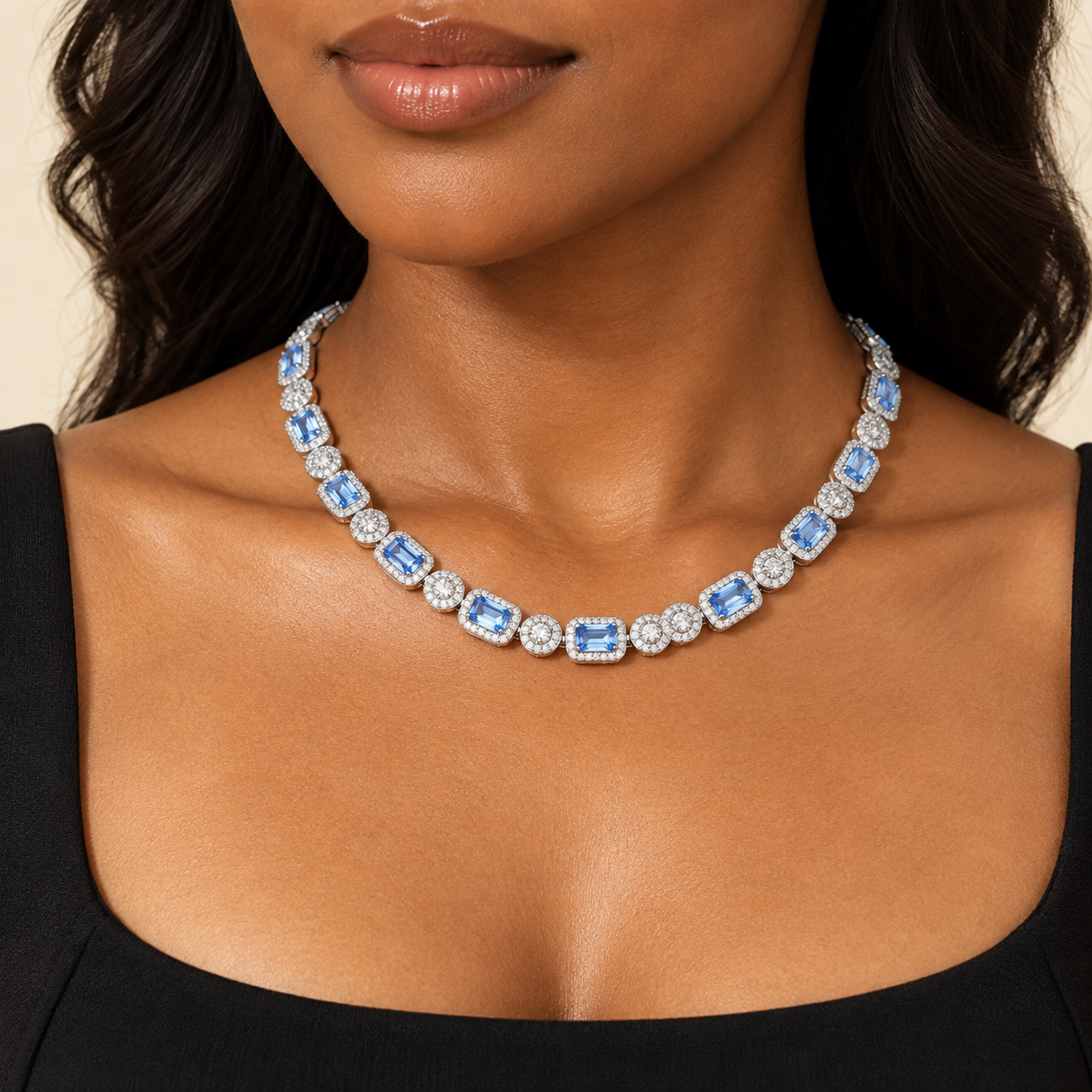 Blue and clear halo necklace styled on a model